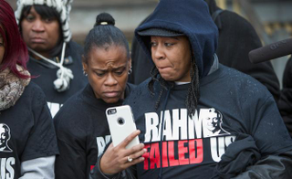 Illustration for article titled Chicago Police Shooting: Victims’ Family and Friends Demand Answers